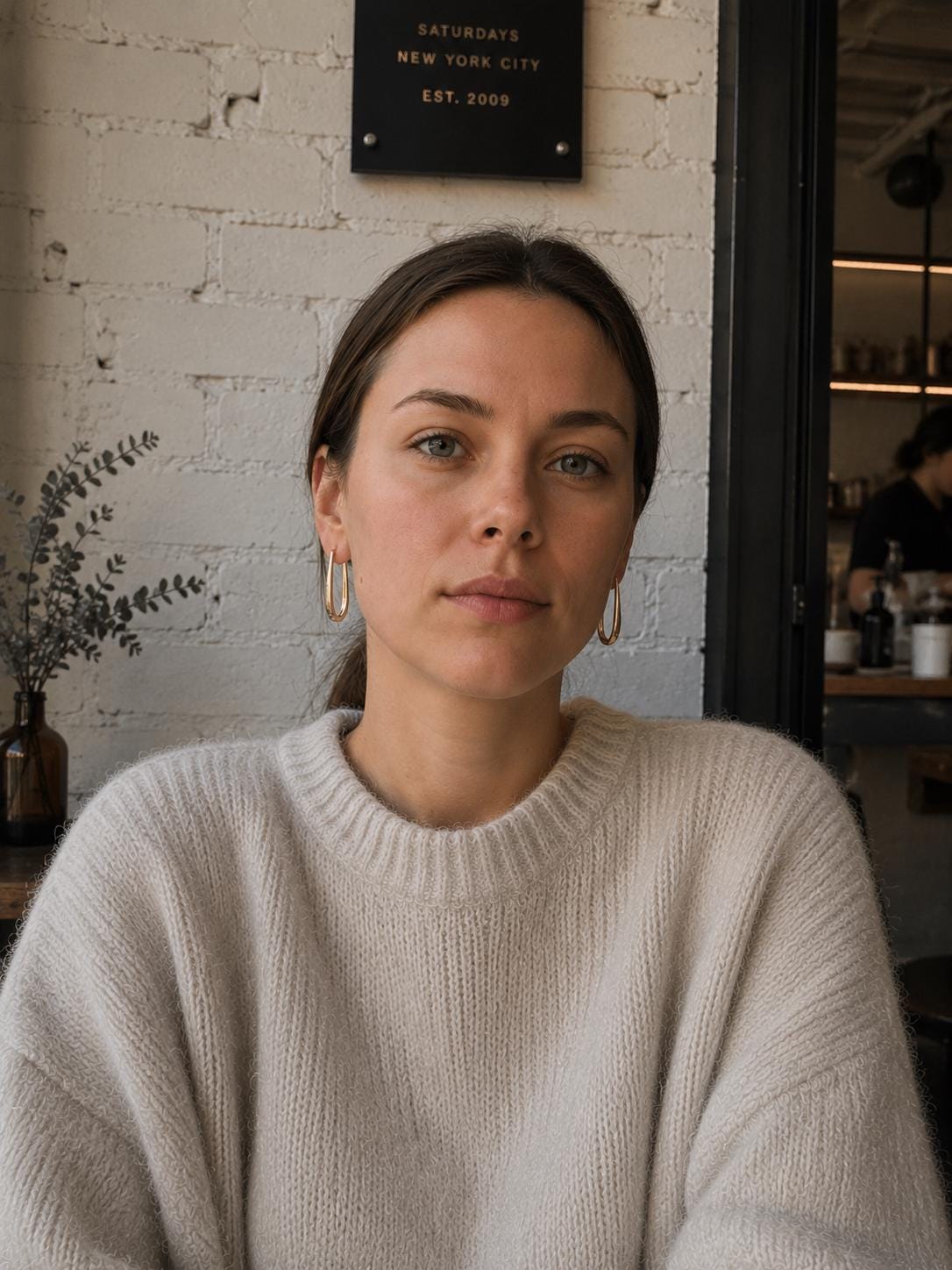 Angular V Wire Hoop Earrings on model